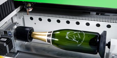 Bottle of champagne engraved with co2 laser machine