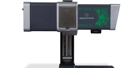 Integrated laser on column for on the fly marking